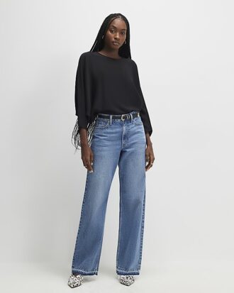 Svart långärmad batwing-top