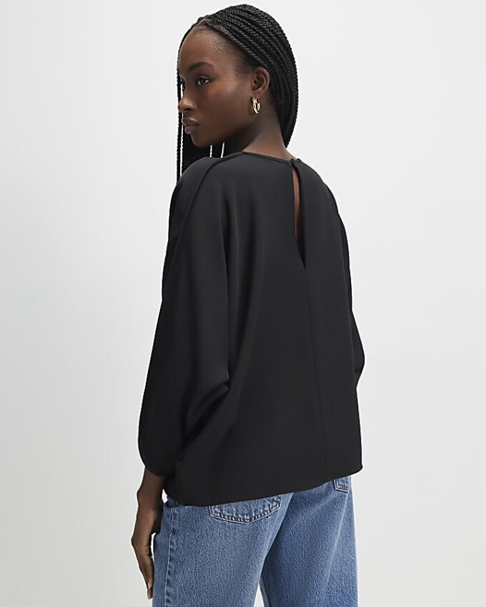 Svart långärmad batwing-top