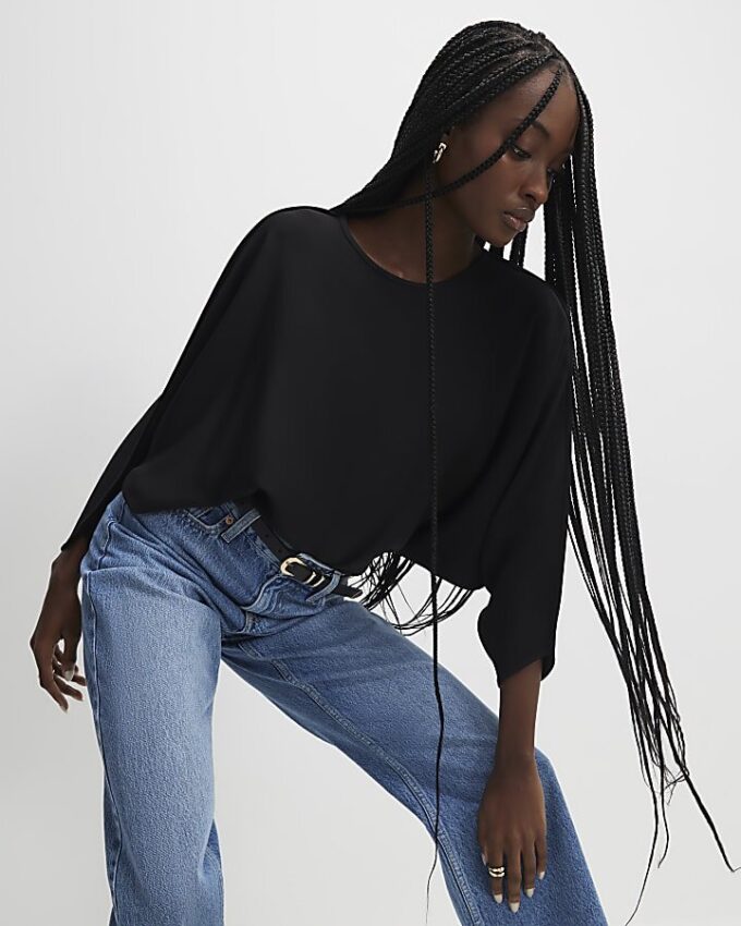 Svart långärmad batwing-top