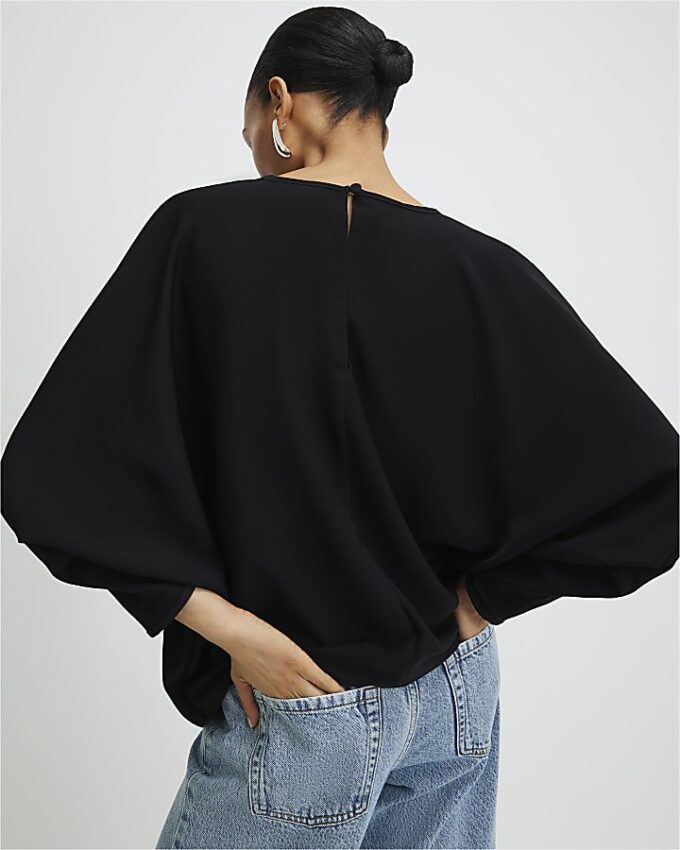Svart långärmad batwing-top