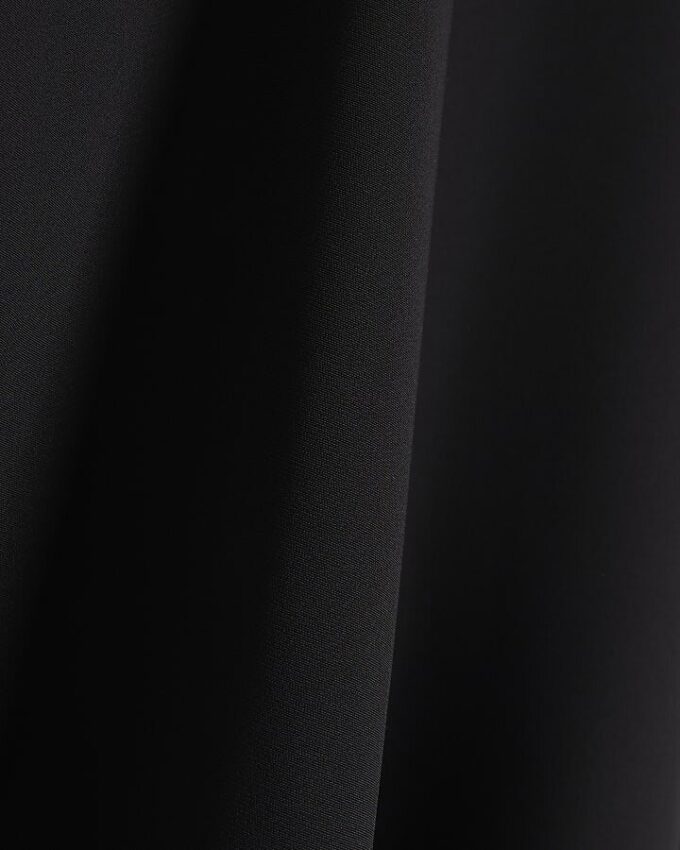 Svart långärmad batwing-top