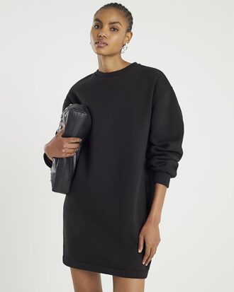 Svart långärmad sweatshirtklänning