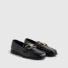 Svart loafers med guldkant