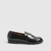 Svart loafers med guldkant