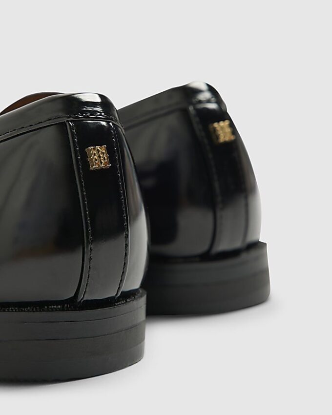 Svart loafers med guldkant