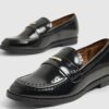 Svart loafers med guldkant
