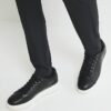 Svart monogrampanel sneakers