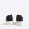 Svart monogrampanel sneakers