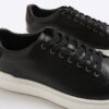 Svart monogrampanel sneakers