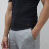 Svart muskelpassad texturerad T-shirt