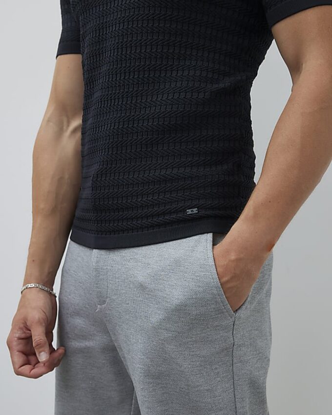 Svart muskelpassad texturerad T-shirt