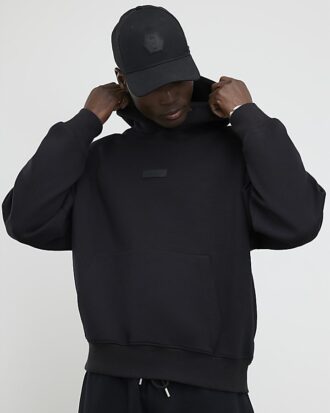 Svart oversized Luminis-hoodie