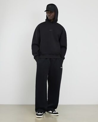 Svart oversized Luminis-hoodie