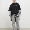Svart oversized-passad T-shirt med lager på lager-mönster Svart oversized-passad T-shirt med lager på lager-mönster