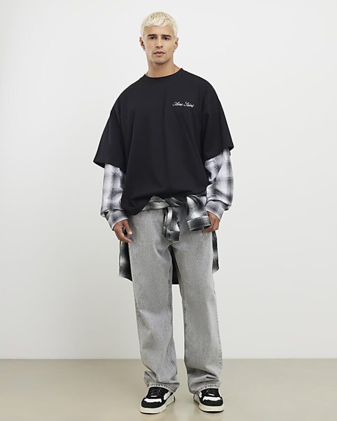 Svart oversized-passad T-shirt med lager på lager-mönster Svart oversized-passad T-shirt med lager på lager-mönster