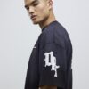 Svart oversized-passformad Dept Inc-T-shirt