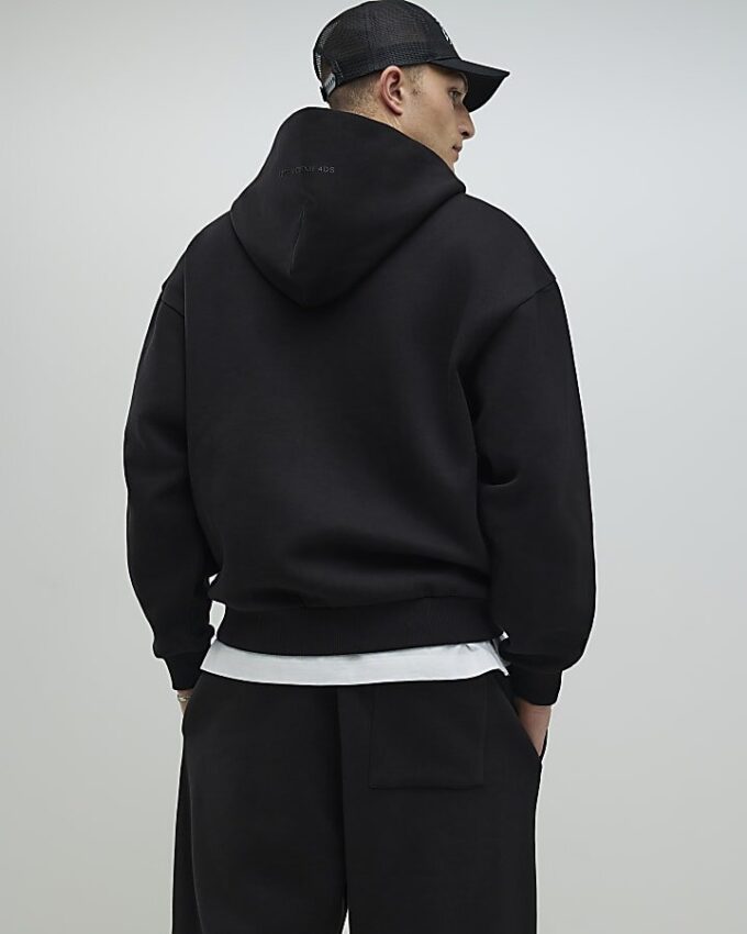 Svart oversized-passformad hoodie med dragkedja