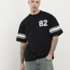 Svart oversized-passformad T-shirt med 72 ränder
