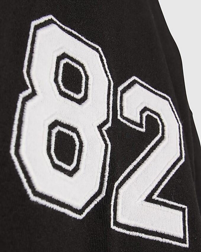 Svart oversized-passformad T-shirt med 72 ränder