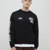 Svart oversized-passformad tröja med alpin badge