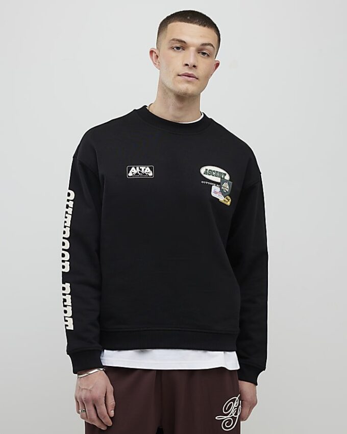 Svart oversized-passformad tröja med alpin badge