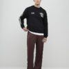 Svart oversized-passformad tröja med alpin badge