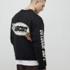 Svart oversized-passformad tröja med alpin badge