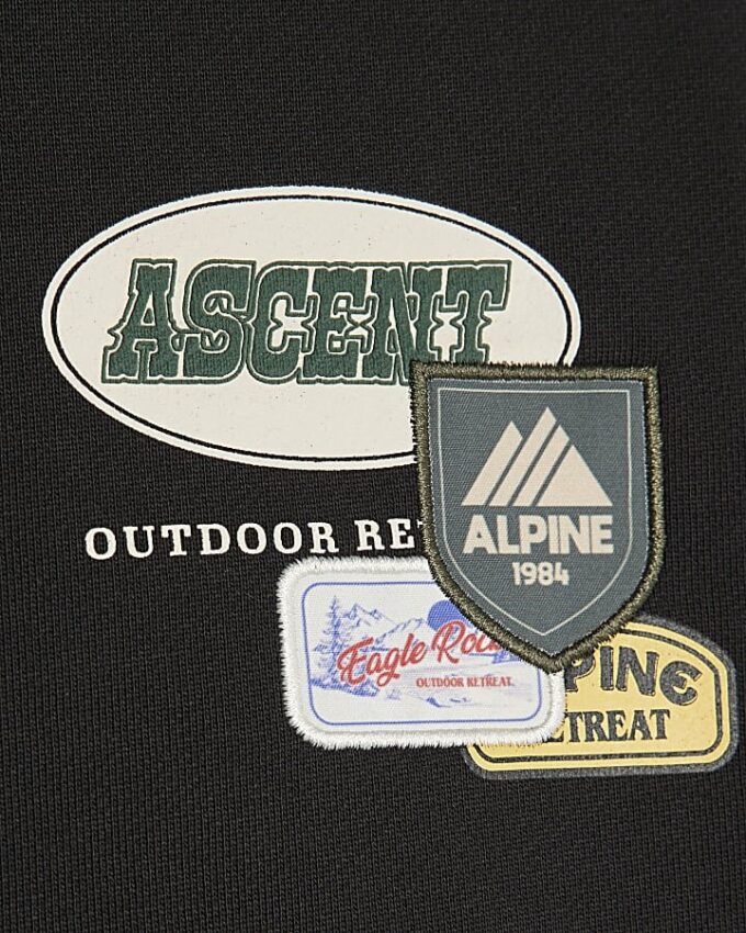 Svart oversized-passformad tröja med alpin badge