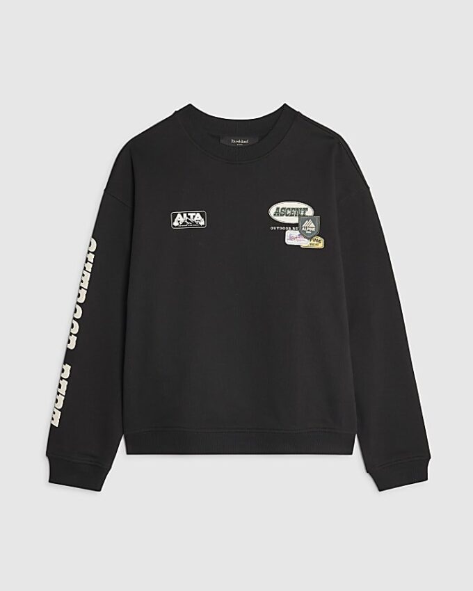 Svart oversized-passformad tröja med alpin badge