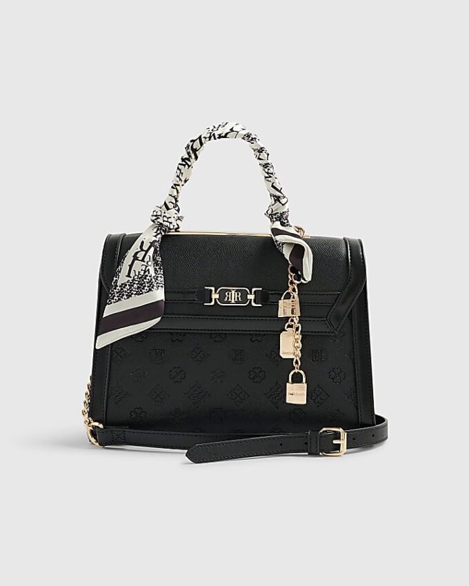 Svart präglad charm-tote