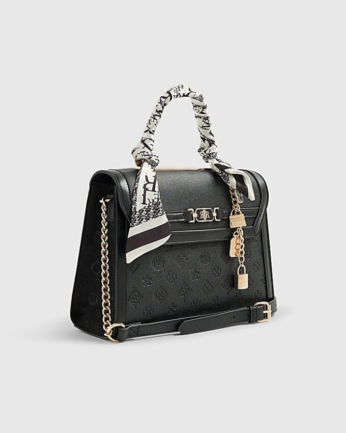 Svart präglad charm-tote