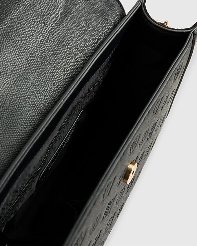 Svart präglad charm-tote