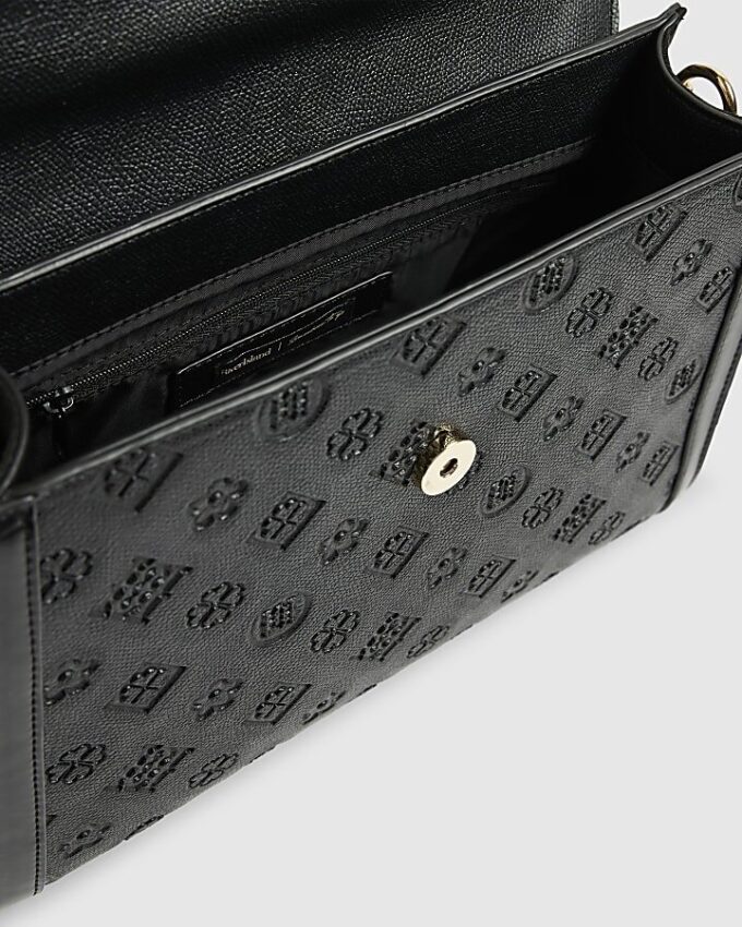 Svart präglad charm-tote