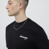 Svart PRP-badge-T-shirt med normal passform
