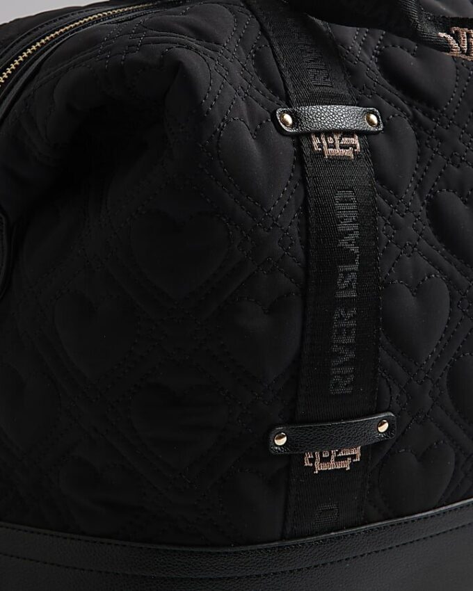Svart quiltad Holdall-väska med hjärtmönster