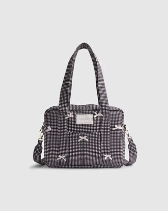 Svart resväska med gingham-mönster och rosett