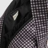 Svart resväska med gingham-mönster och rosett