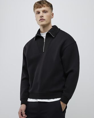 Svart ribbad sweatshirt med normal passform
