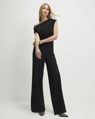Svart ärmlös asymmetrisk draperad jumpsuit