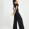 Svart ärmlös asymmetrisk draperad jumpsuit
