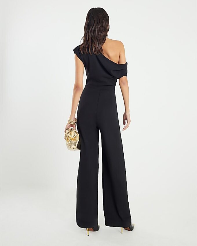 Svart ärmlös asymmetrisk draperad jumpsuit