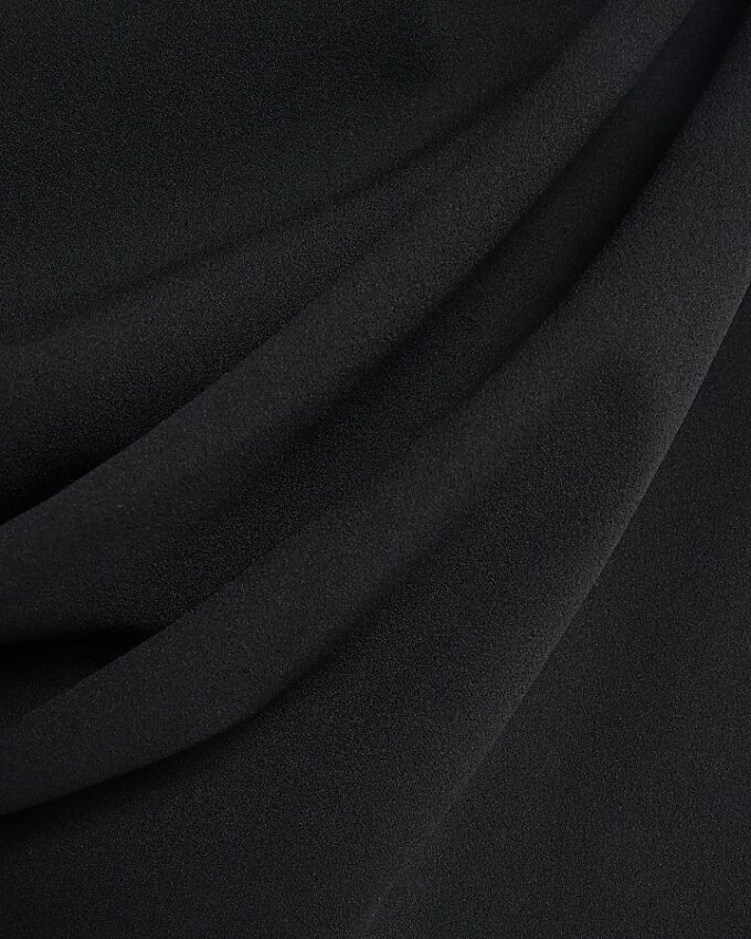 Svart ärmlös asymmetrisk draperad jumpsuit
