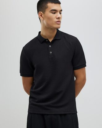 Svart slim fit-polotröja med struktur