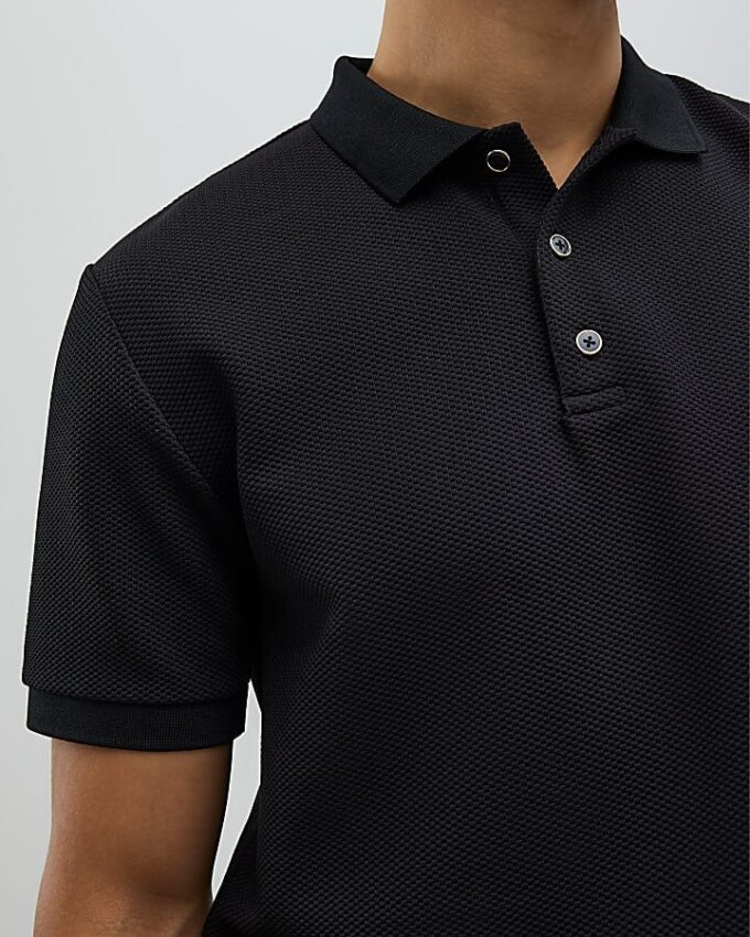 Svart slim fit-polotröja med struktur