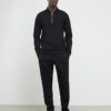 Svart slim fit-polotröja med struktur