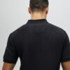 Svart slim fit-polotröja med struktur