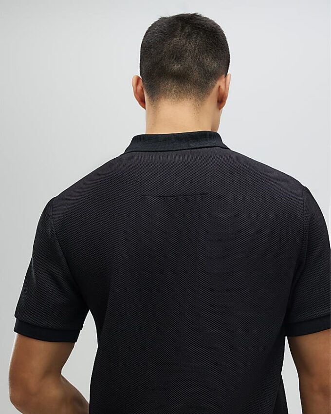Svart slim fit-polotröja med struktur