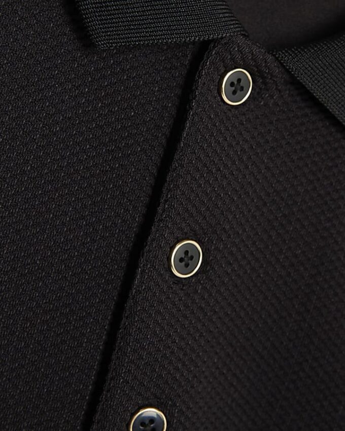 Svart slim fit-polotröja med struktur