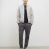 Svart slim fit-polotröja med textur och dragkedja