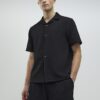 Svart slim fit-skjorta med revers